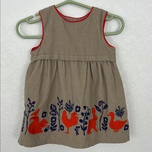 Baby Boden Embroidered Tan Dress with Red and Blue Embroidered Accents 0-3 mo
